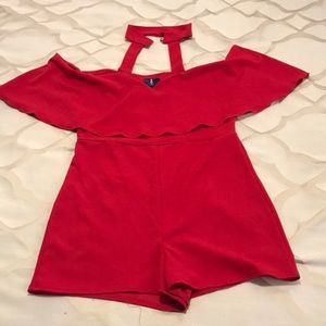 Romper w/ choker and V neck line.
